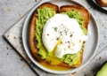 A plate of Avocado Toast with a poached egg for a Budget Brunch Spread.