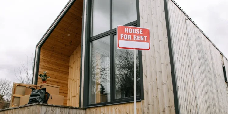 A low level shot of a wooden house. Rental properties can be lucrative if you know what you're looking for.