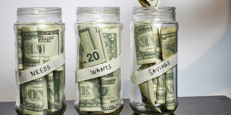 Splitting your money into Needs Wants and Savings is how to set up the 50/30/20 budget ratio.