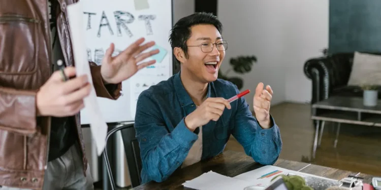 Attentive man sits in business meeting