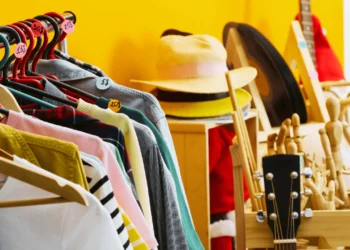 Closeup of items at a garage sale. Sell your stuff to make some extra cash.