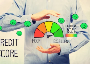 Man stands behind illustrations of having a good credit score. There are 2 key areas to focus on to increase your credit score.