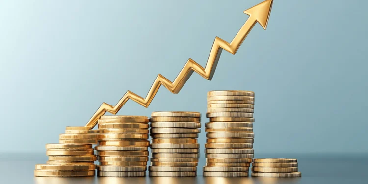 Stacks of gold coins with an arrow traveling up.